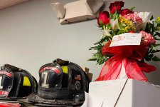 Islip-FD-Jesse-Gerhard-helmet-and-flowers.jpg