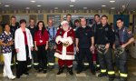 Santa_Firefighers_NYM_Staff_2012.jpg