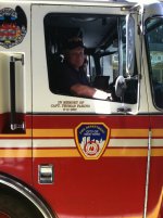 Capt Bob Rainey Ret. Eng. 26 on E-26s New Fararra HP Pumper.jpg