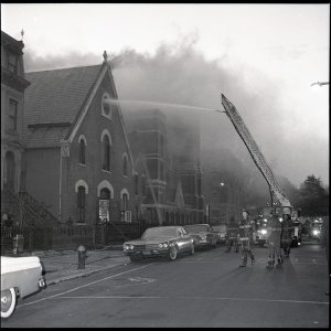 FDNY Church Fire Ladder Pipe in Rose Window.jpg