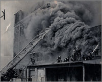 FDNY Bklyn 5-5 on 3-30-62  Lt. Hamilton & R-2 on Shed Roof.jpg